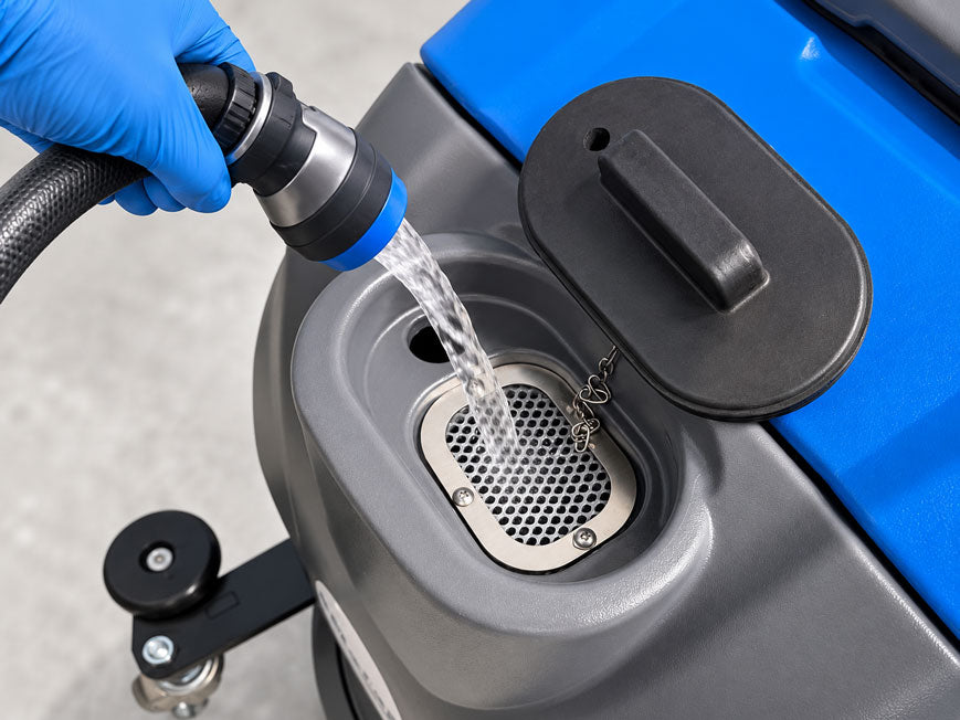 Solution fill opening and mesh strainer